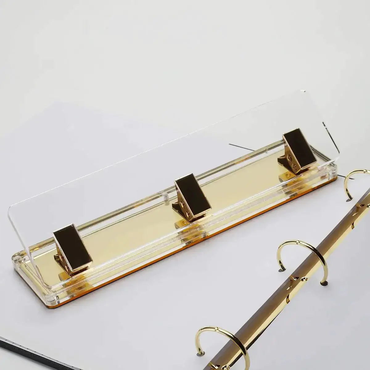 Clear Acrylic 3 Hole Punch For 10 Sheets With Four And A Quarter Inch Hole Spacing Gold Accents Easy No Fuss Desktop Puncher Magnetic Detachable Base Anti Slip Pad 3 Ring Binder Compatible Office Desk Accessory - Image 3